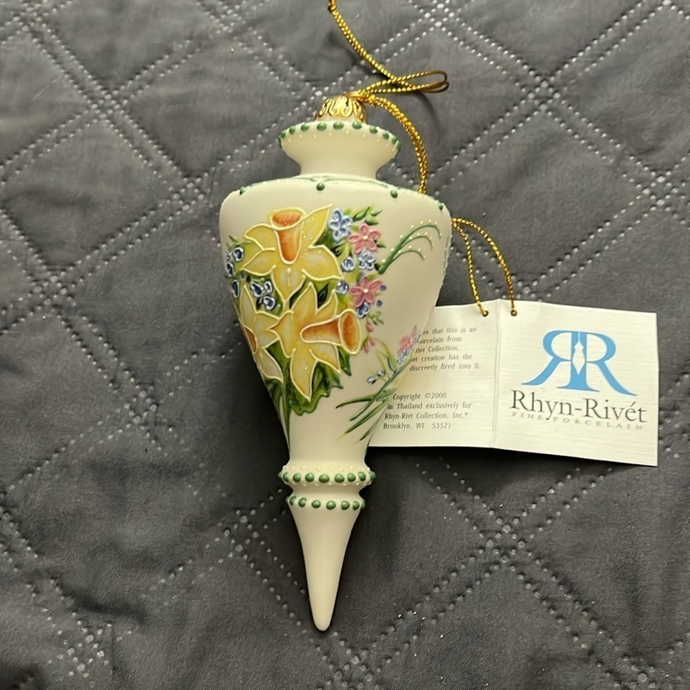 Rhyn- Rivet Individually hand poured and molded bisque porcelain ornament. NWT